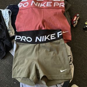 2 pairs Nike pro XS